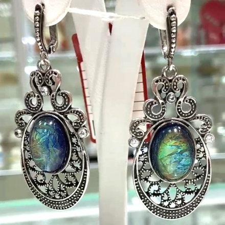 серебряные серьги камнями длинные