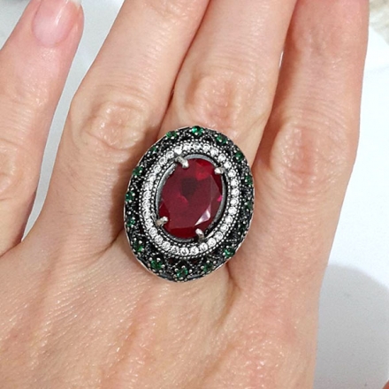серебряные серьги с крупным камнем