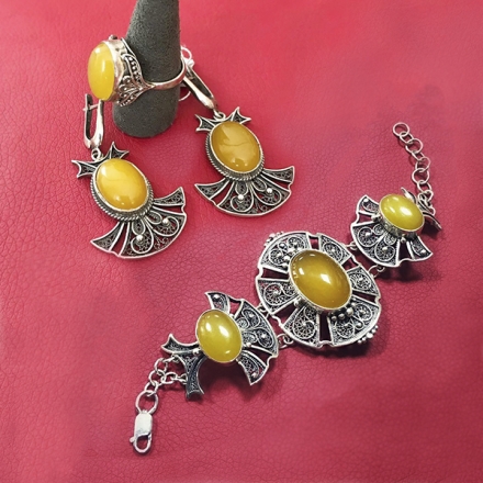 серебряные украшения желтого цвета