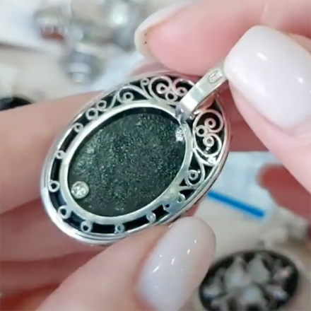 серебряное кольцо с черным камнем