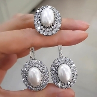серебряные серьги с камнями