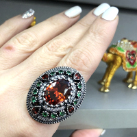 серебряные серьги с крупным камнем