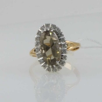 Кольцо из золота с раухтопазом и бриллиантами