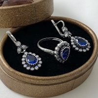 серебряное кольцо +с синим камнем