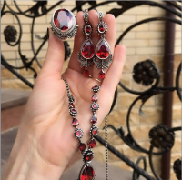 серебряный браслет +с красными камнями