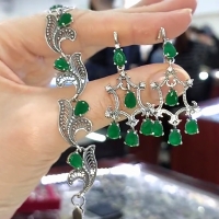 серьги кольца +с зелеными камнями